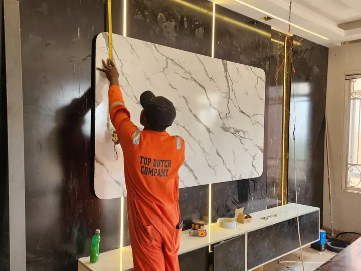 Wall cladding, marble effect surfaces, and feature installation