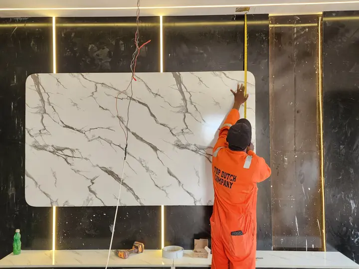 TV wall and surface finishing in progress