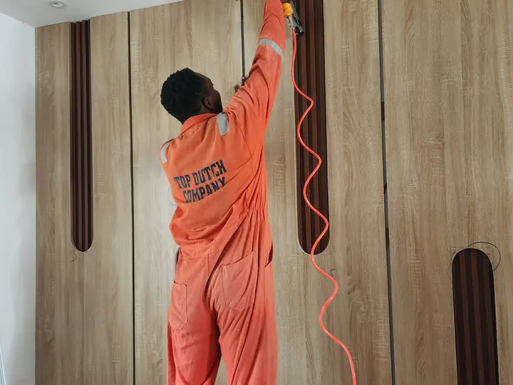 Custom wood panel and wardrobe detail installation