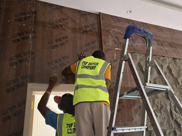 Wood feature wall finishing and installation progress