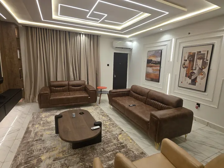 Finished residential sitting room with modern ceiling design