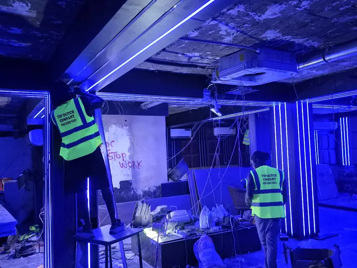 Atmospheric lighting installation for a hospitality-style interior